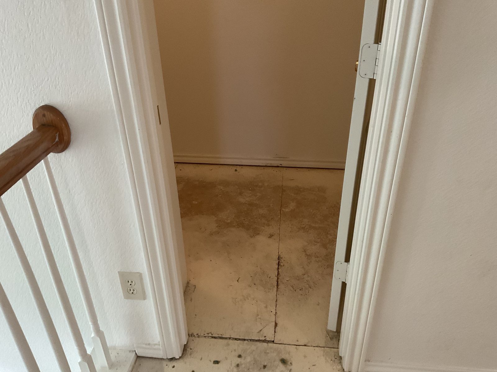Before: worn hallway floor