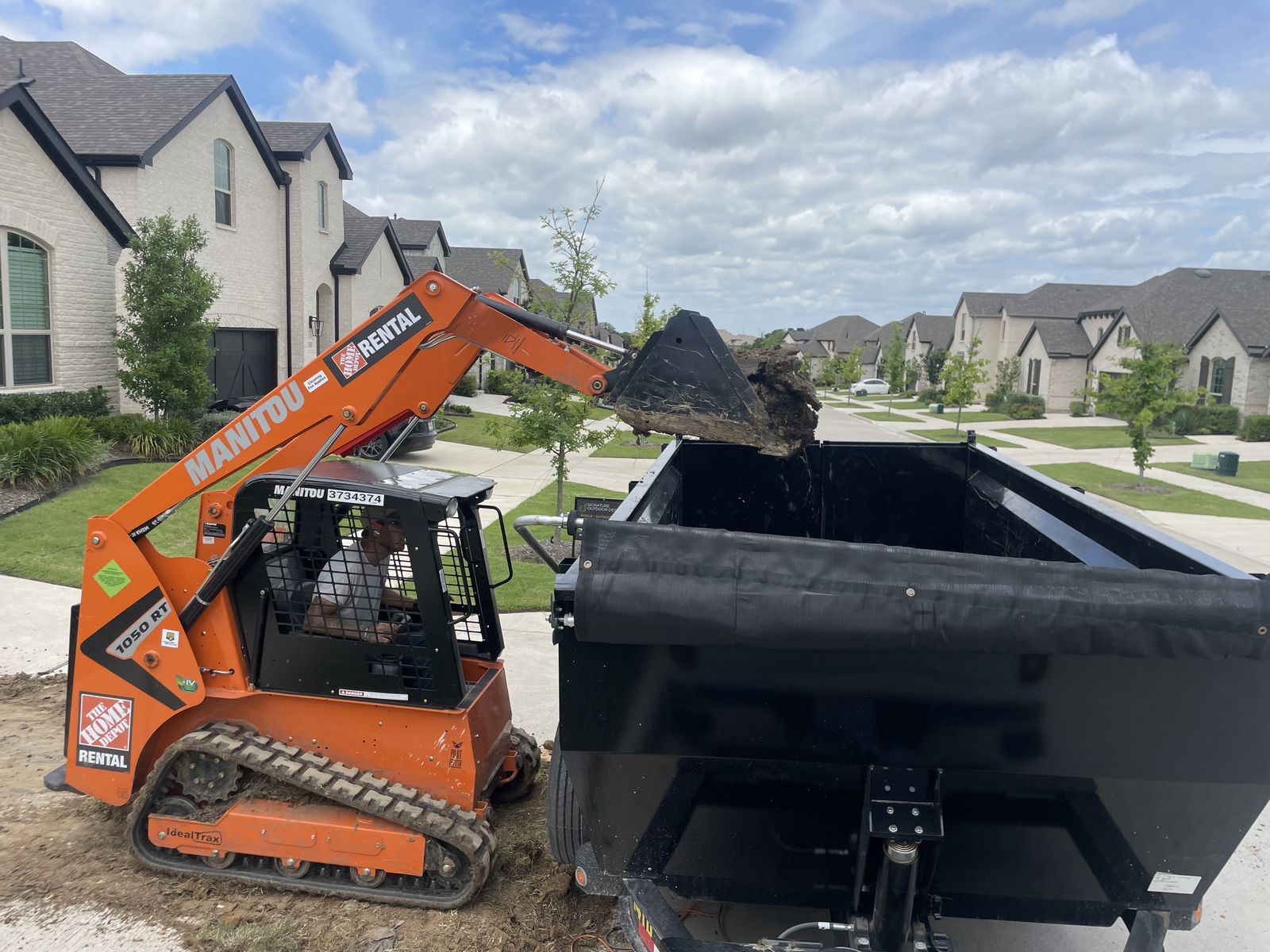 Skid steer loading debris trailer